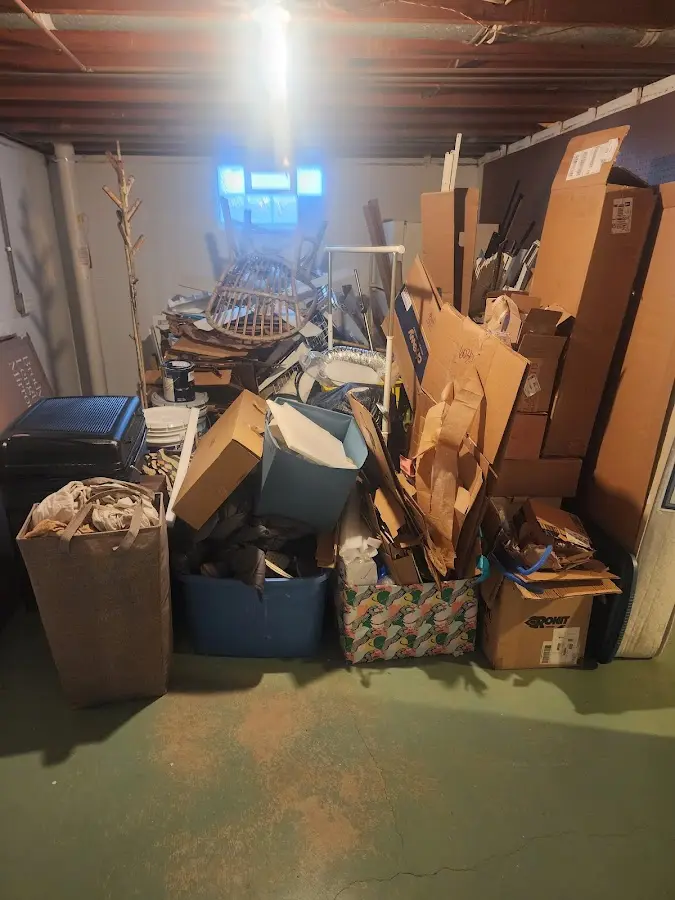 Roll-off dumpster container at job site for Yard Waste Dumpster Rental in Mahtomedi